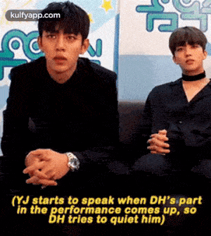 (yj starts to speak when dh's partin the performance comes up, sobh tries to quiet him).gif