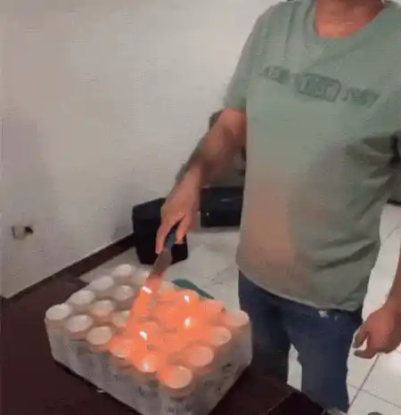 Man Celebrates Birthday with Beer Can Cake