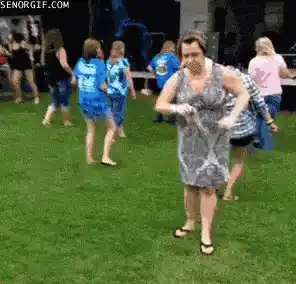 Energetic Woman Dancing at Outdoor Party