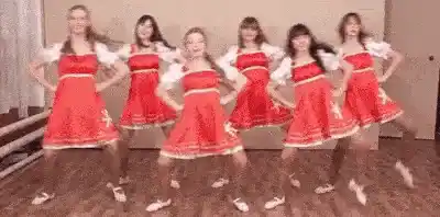 Girls in Red Dresses Perform Dance