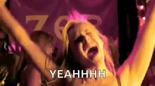 Woman Dancing Excitedly at Club Party