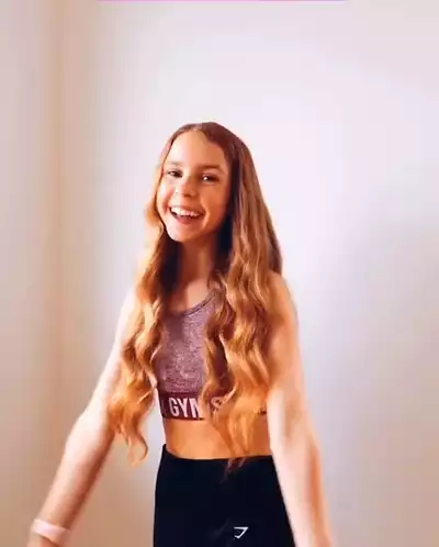 Happy Excited Girl in Gym Top