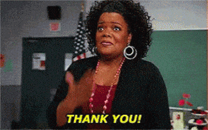 Woman Expresses Gratitude in Classroom