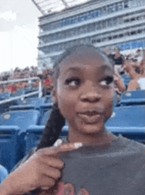 Woman Reacts to 'Thick Love Me' in Stadium