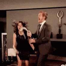 Excited Couple Celebrates with Champagne