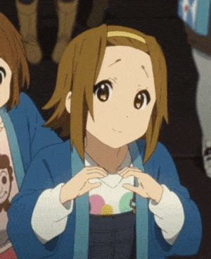 Anime Girl Makes Heart Gesture