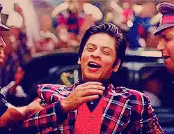 Heartfelt Laughter: Man in Plaid Shirt