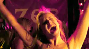 Excited Woman Dancing at Party